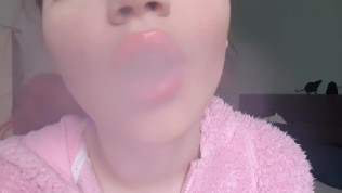 Big pink lucious lips smoking close up